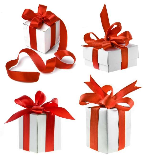 White Gift Boxes with Red Ribbon Over White Background