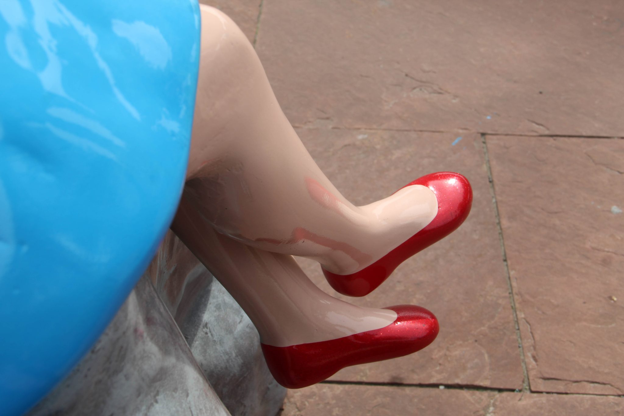 Shark Girl's feet. Shark Girl is a fiberglass sculpture in the Canalside area of Buffalo, New York.