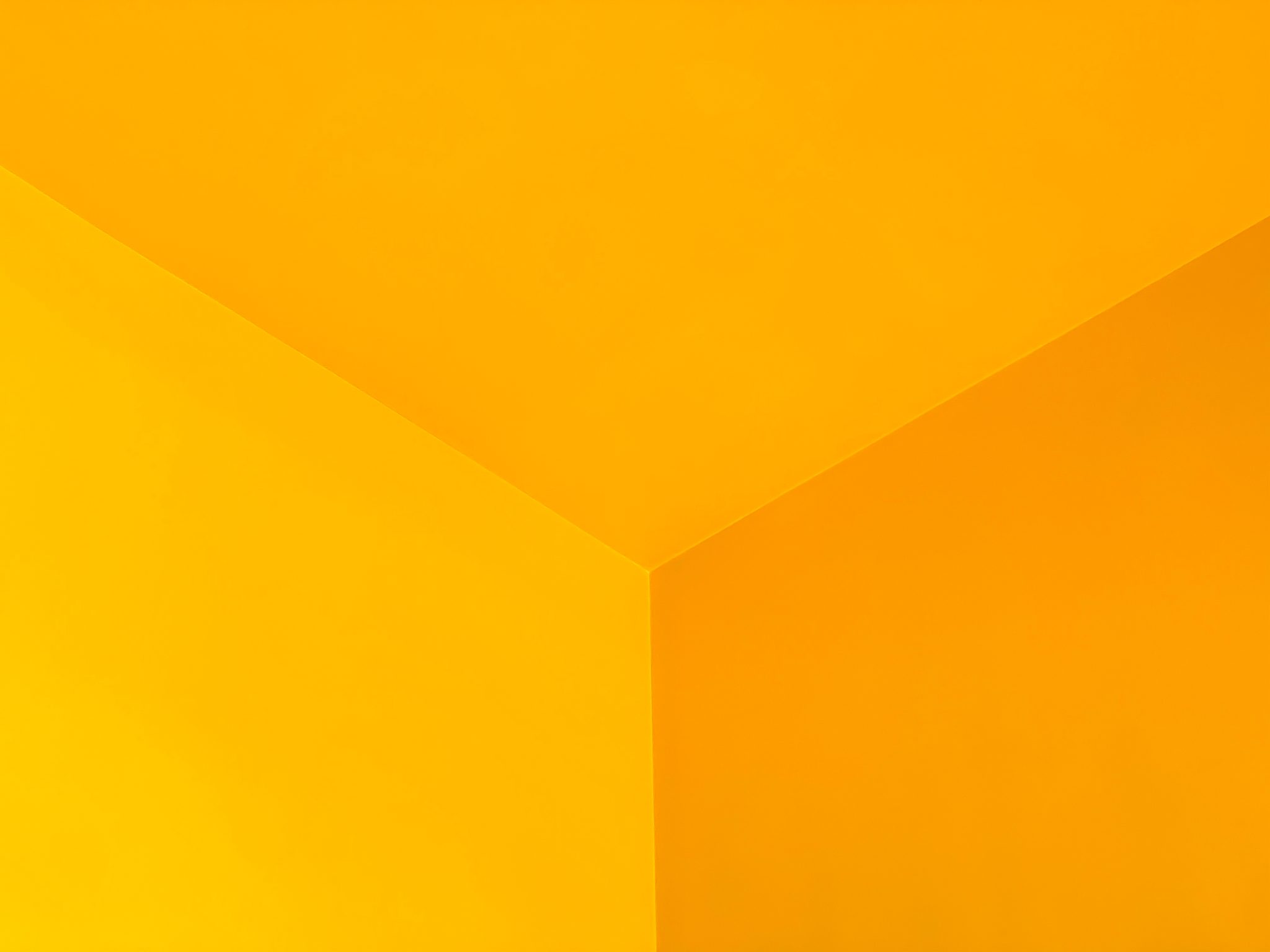 abstract photo showing the angle of the yellow wall on the ceiling