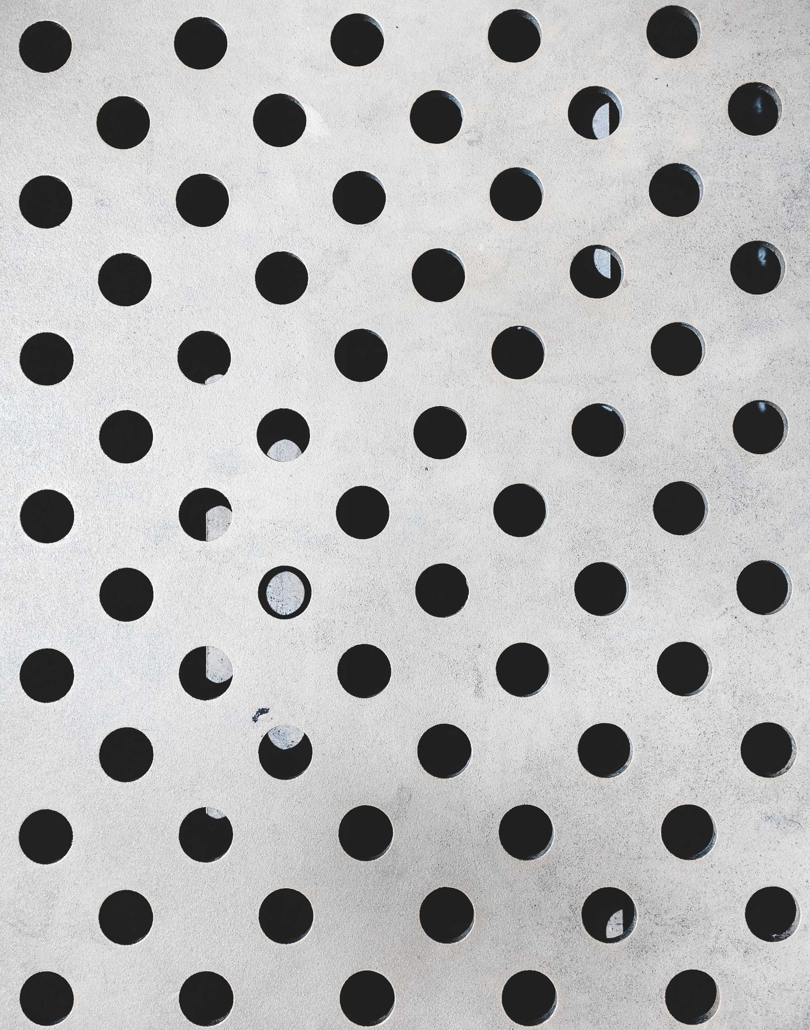 Dots curved in metal plate pattern