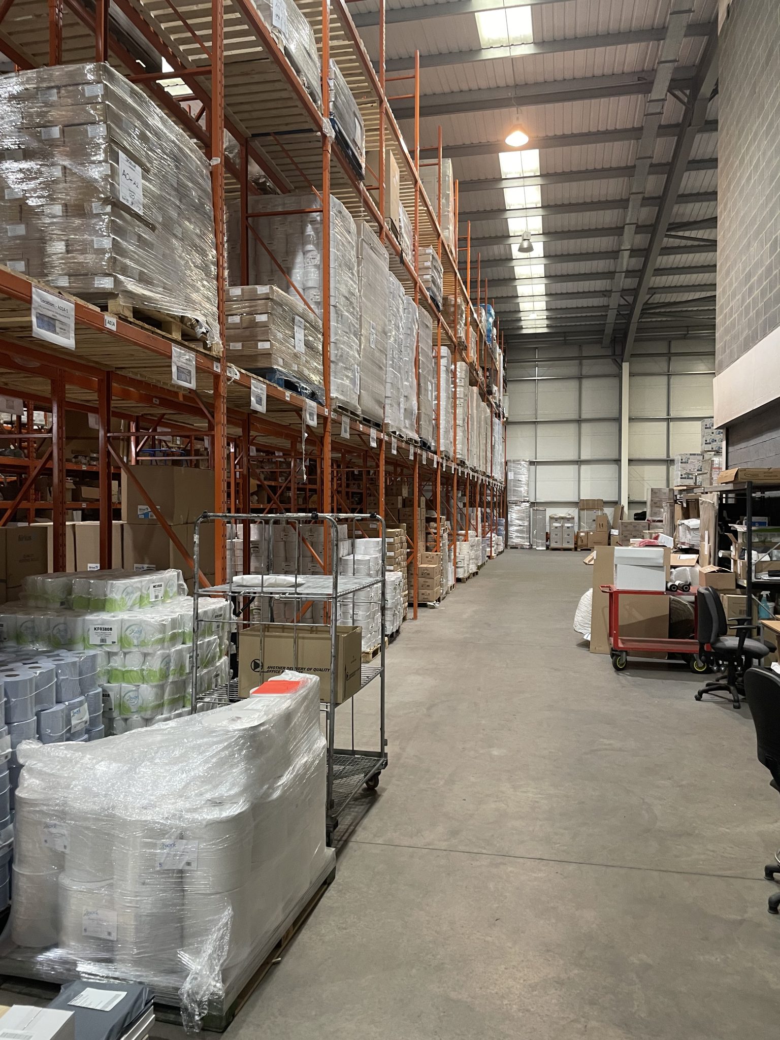 Warehousing environment storing, picking and packaging.