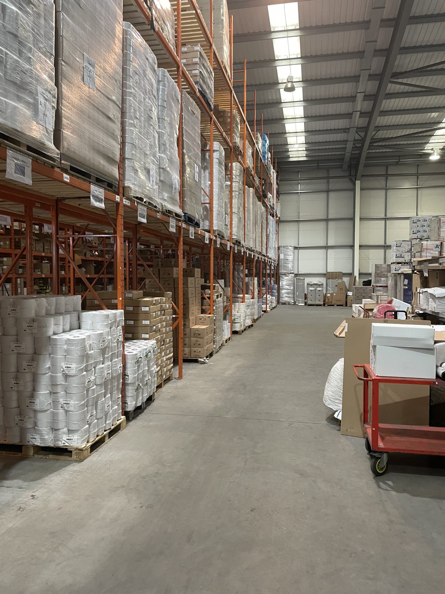 Warehousing environment storing, picking and packaging.