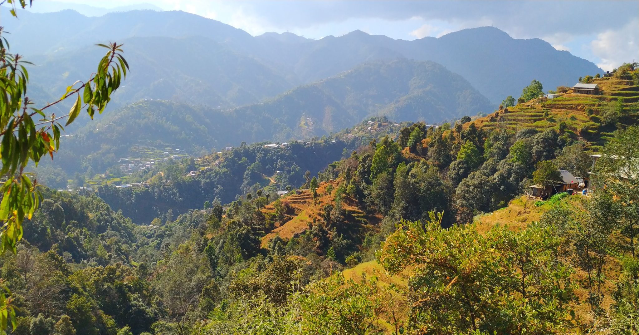 Unveiling the Serene Charm of a Nepali Village near Kavre. Far view across hilltops.
