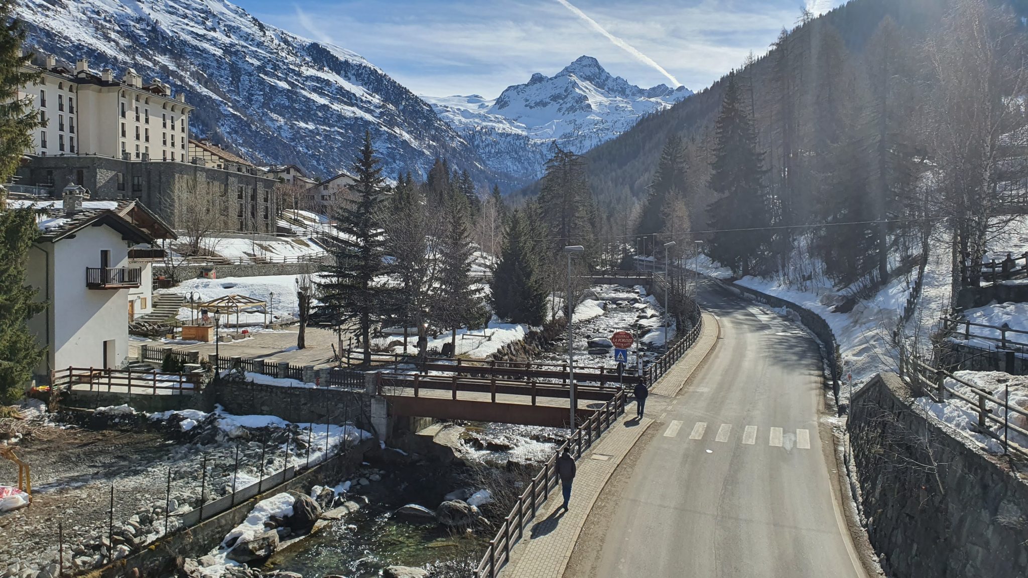 Mountain road with torrent, La Thuile, Valle d'Aosta, Italia
