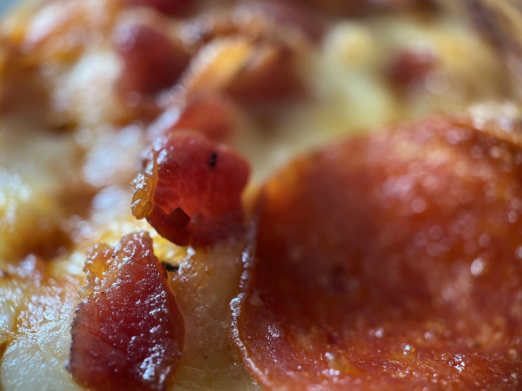 Bacon and Pepperoni on a pizza