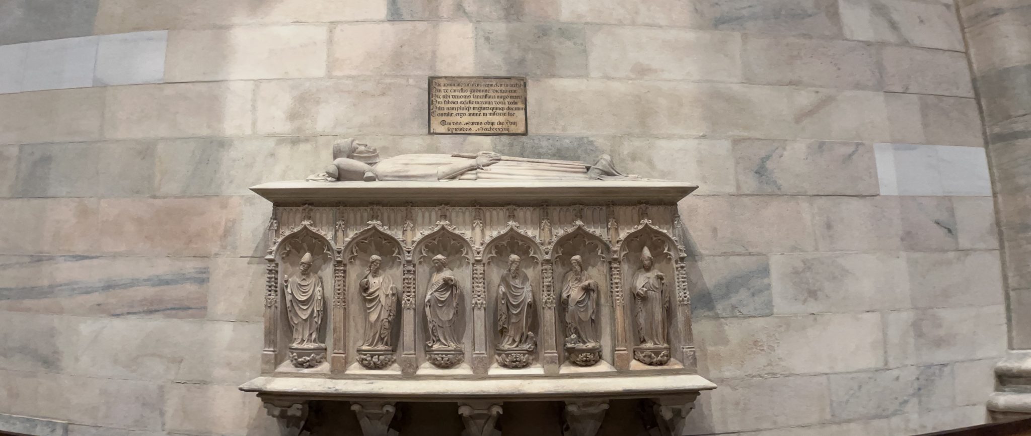 Grave inside a cathedral, duomo de milano, milan, italy, cathedral