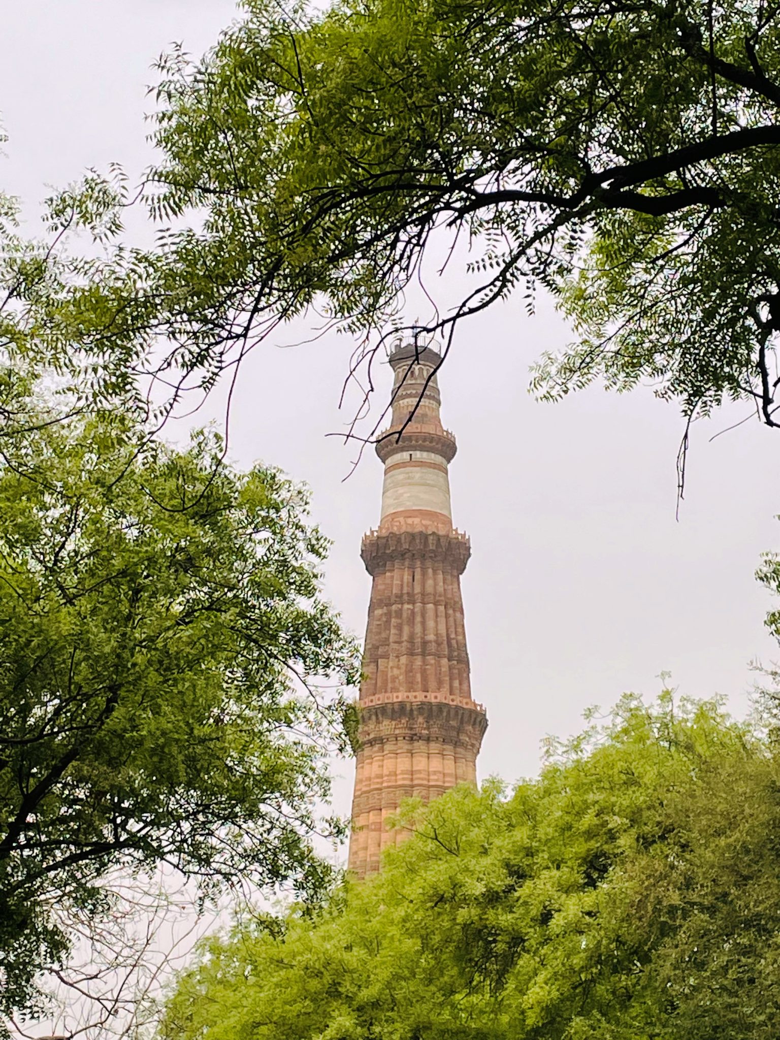 A long view of Qutb Minar, Delhi, India. One of the major tourist attractions of Delhi. It is built in the early 13th century