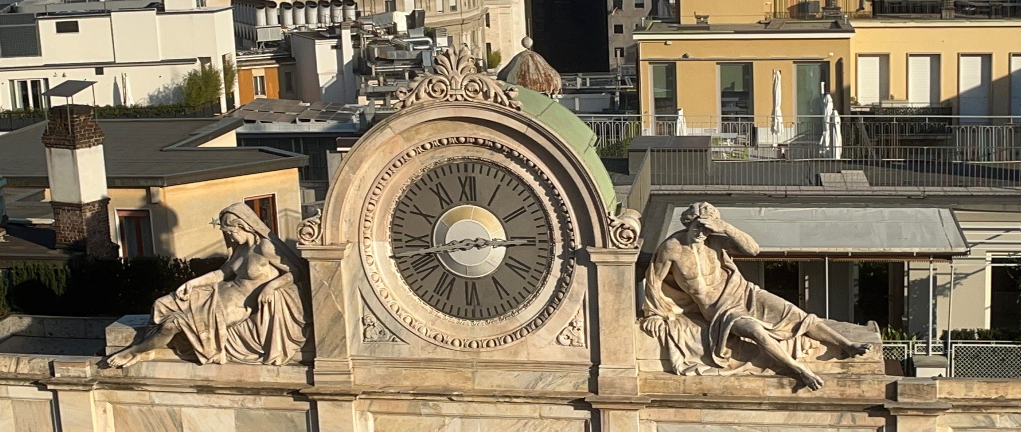 Statuesque clock, Milan, Italy