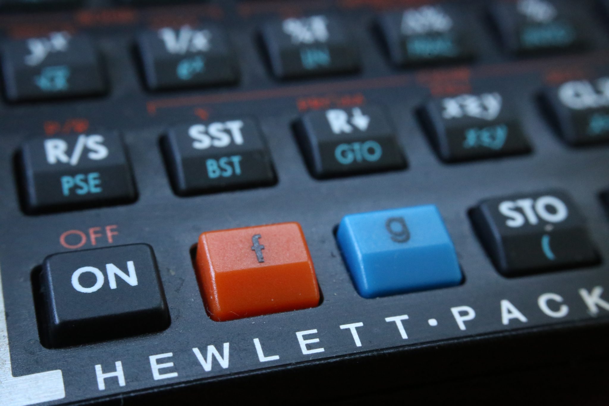 Closeup of ON button from a Hewlett-Packard financial calculator