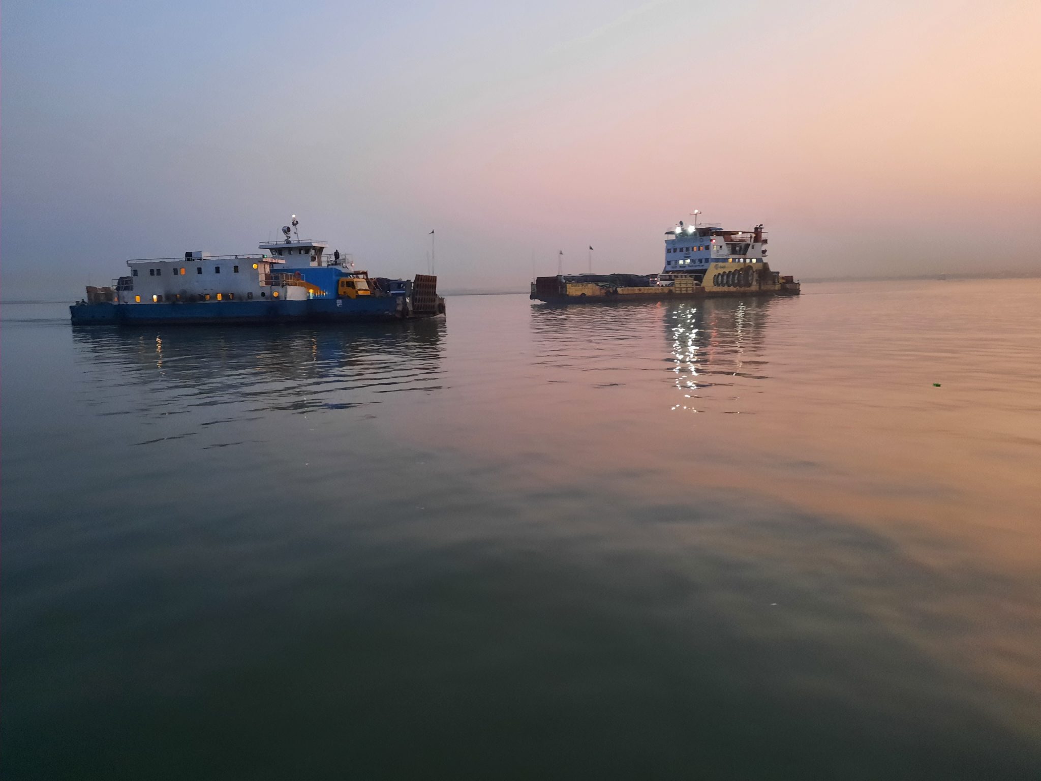 Two ferry crosses the River of Padma.