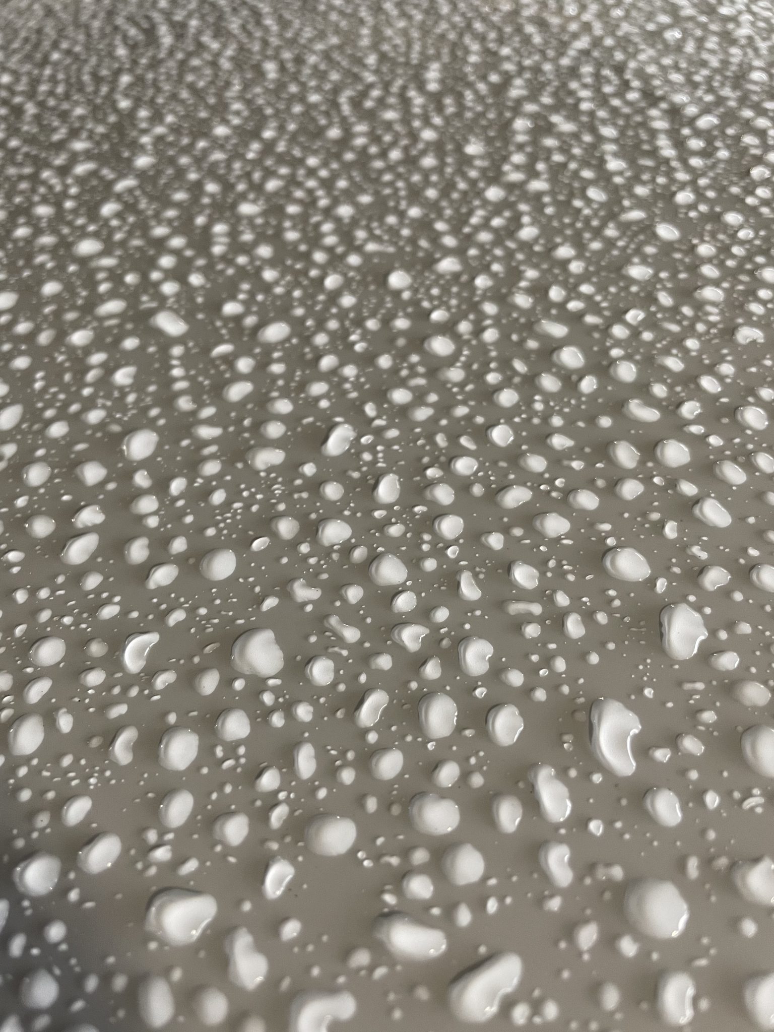 Waterdrops on a car hood