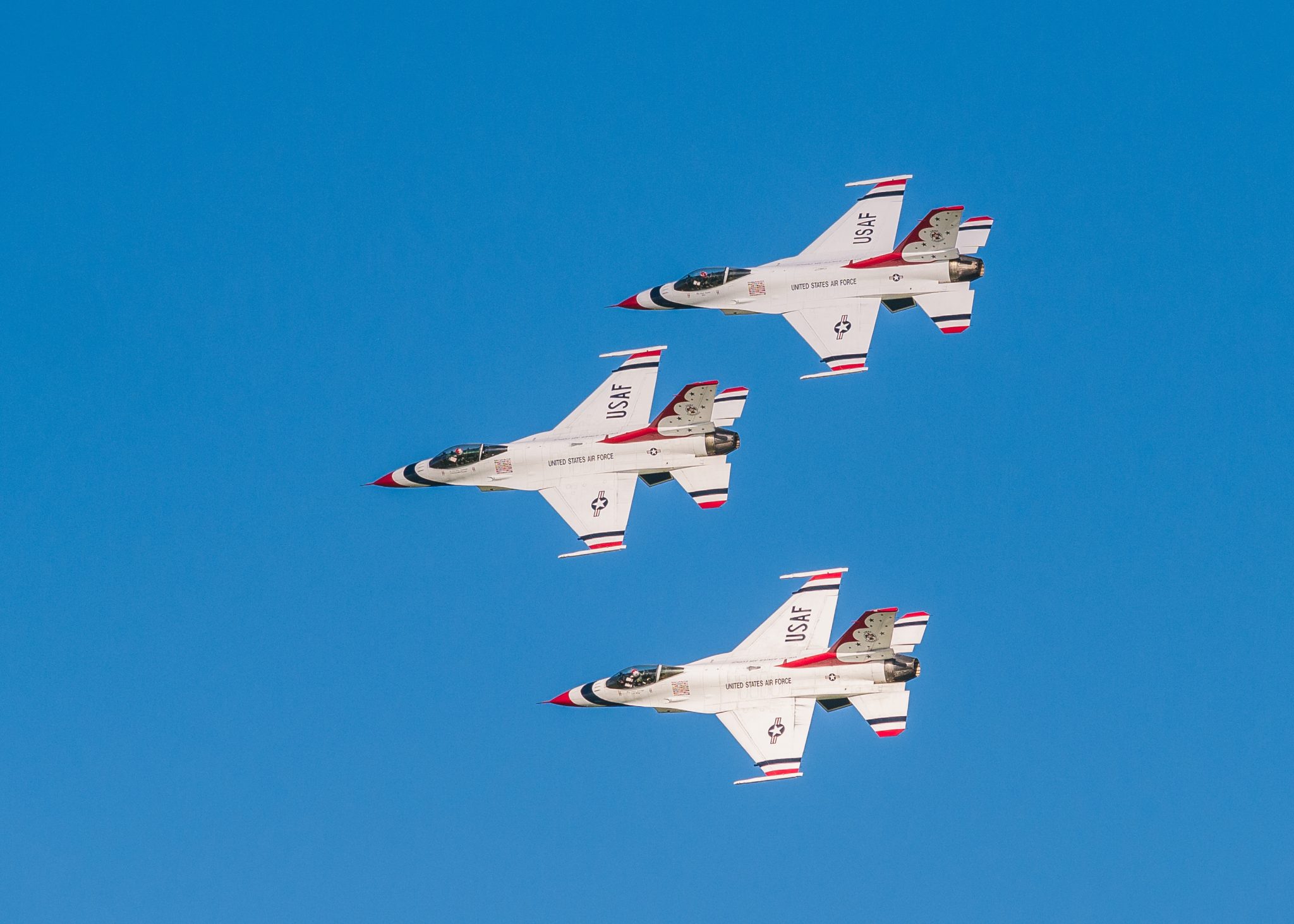 United States Air Force jets flying in formation at an air show