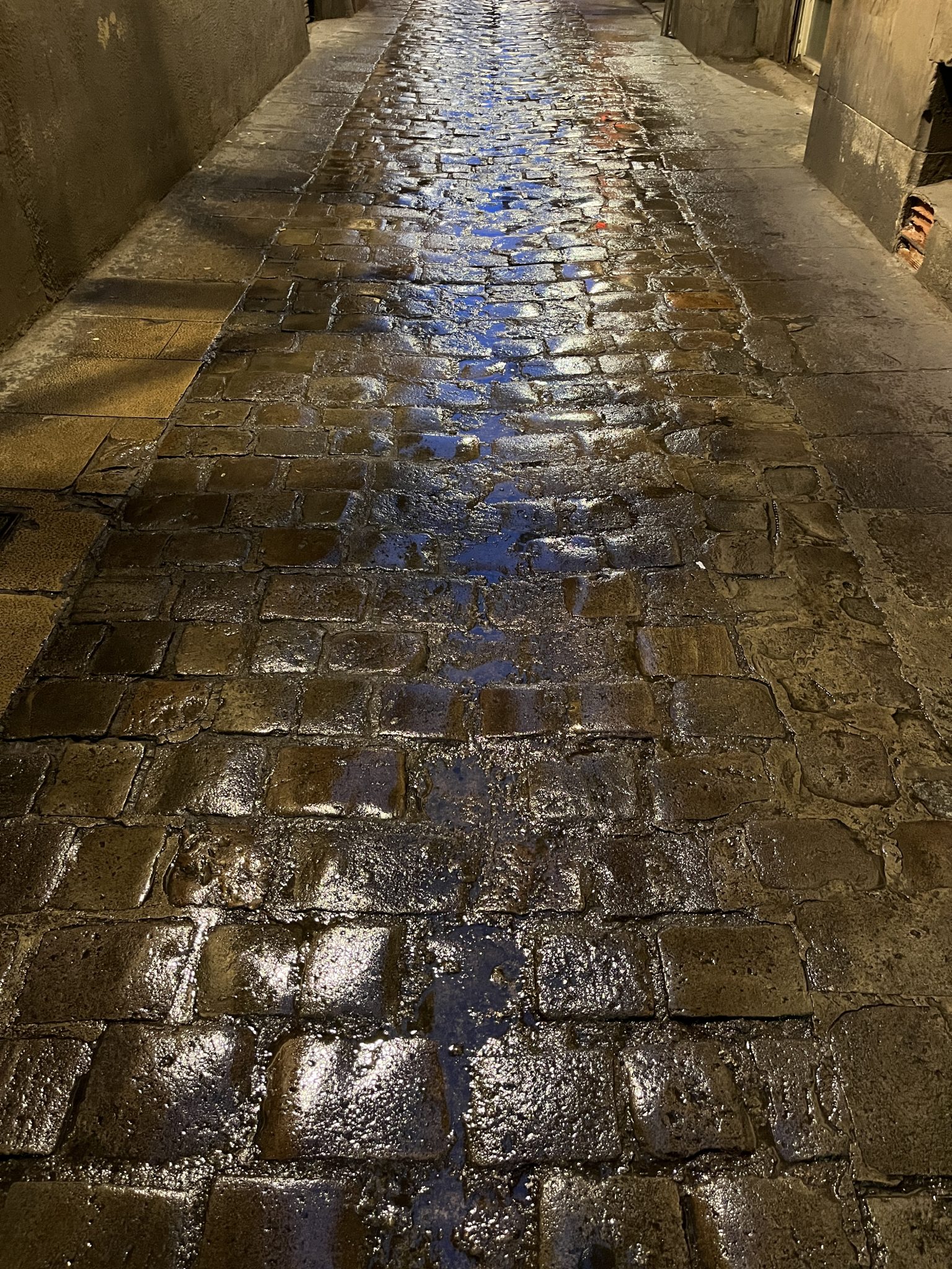Rain on cobblestones, Barcelona, Spain