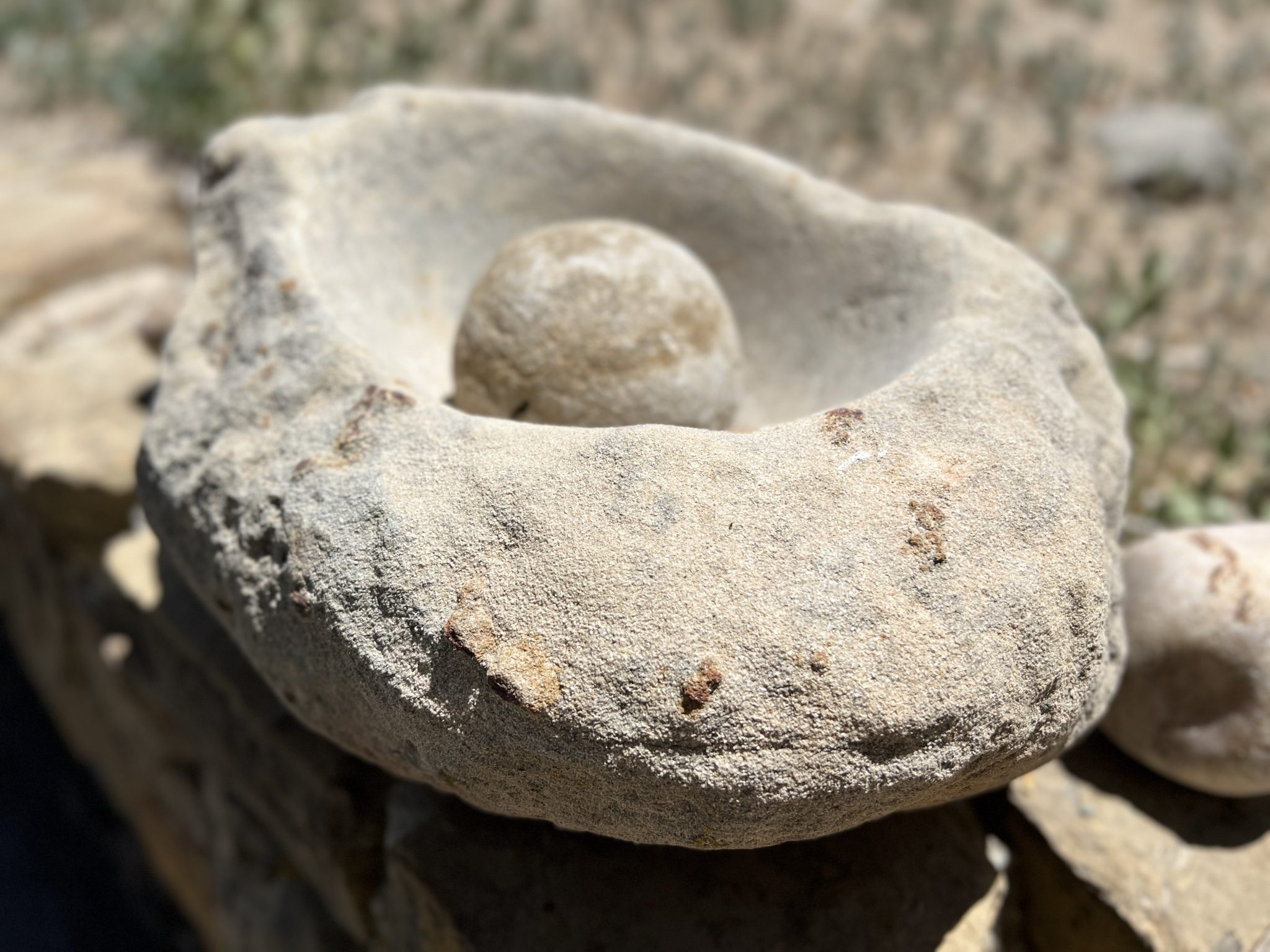 Ancient puebloan griding rock and pestle