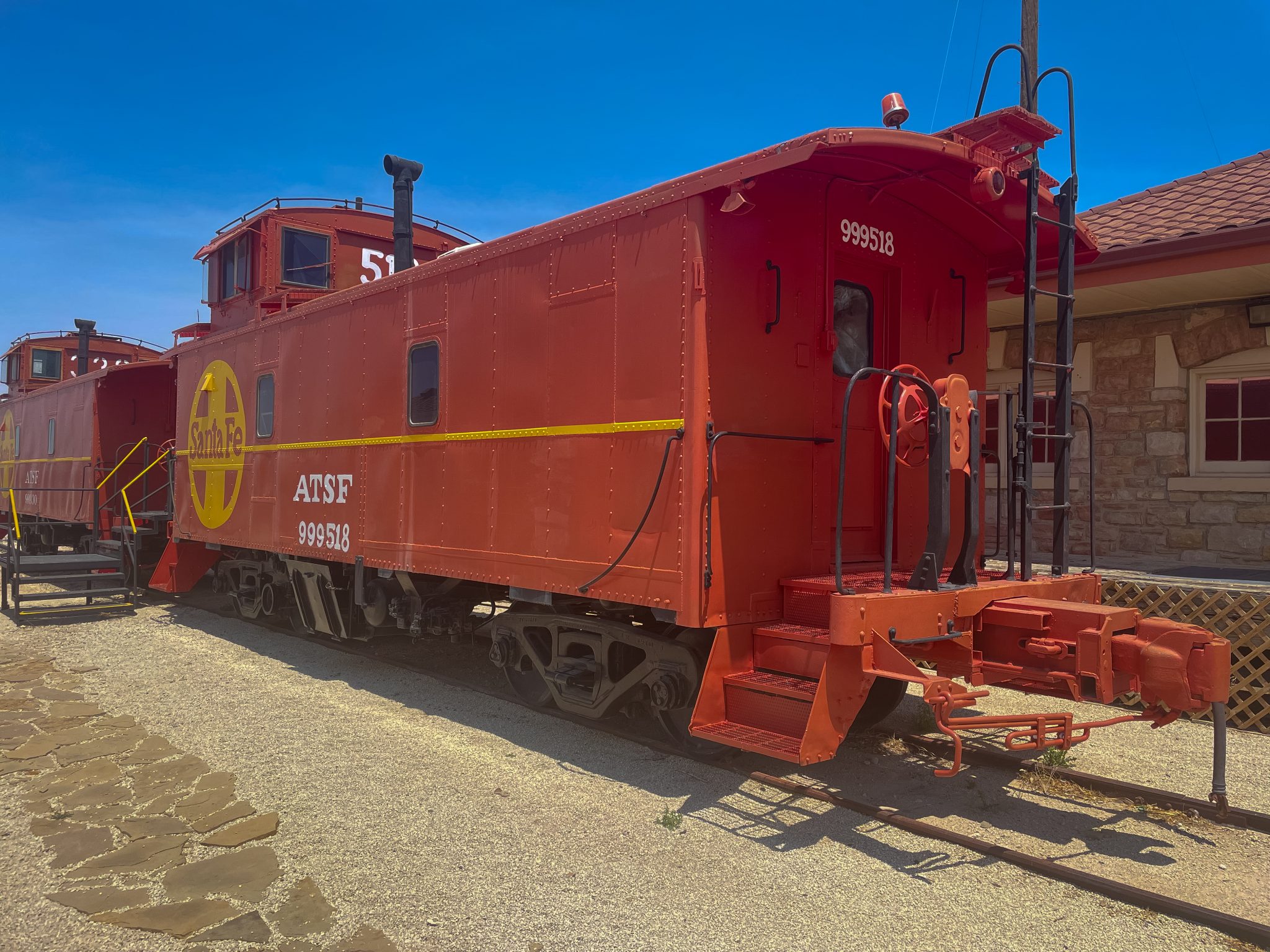 An Atchison Topeka and Santa Fe caboose on display in Fort Stockton, Texas