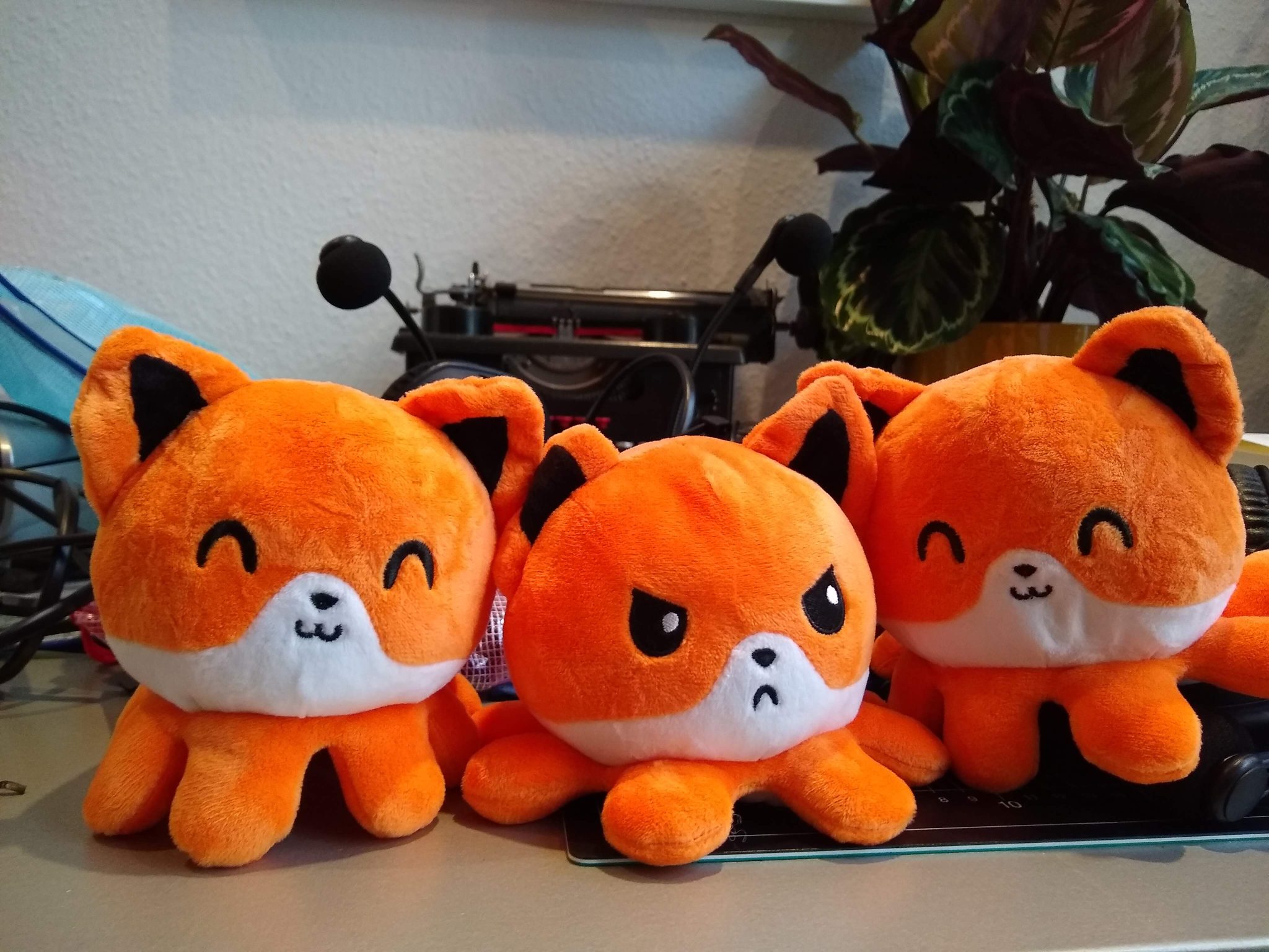 Happy and angry cuddly toys