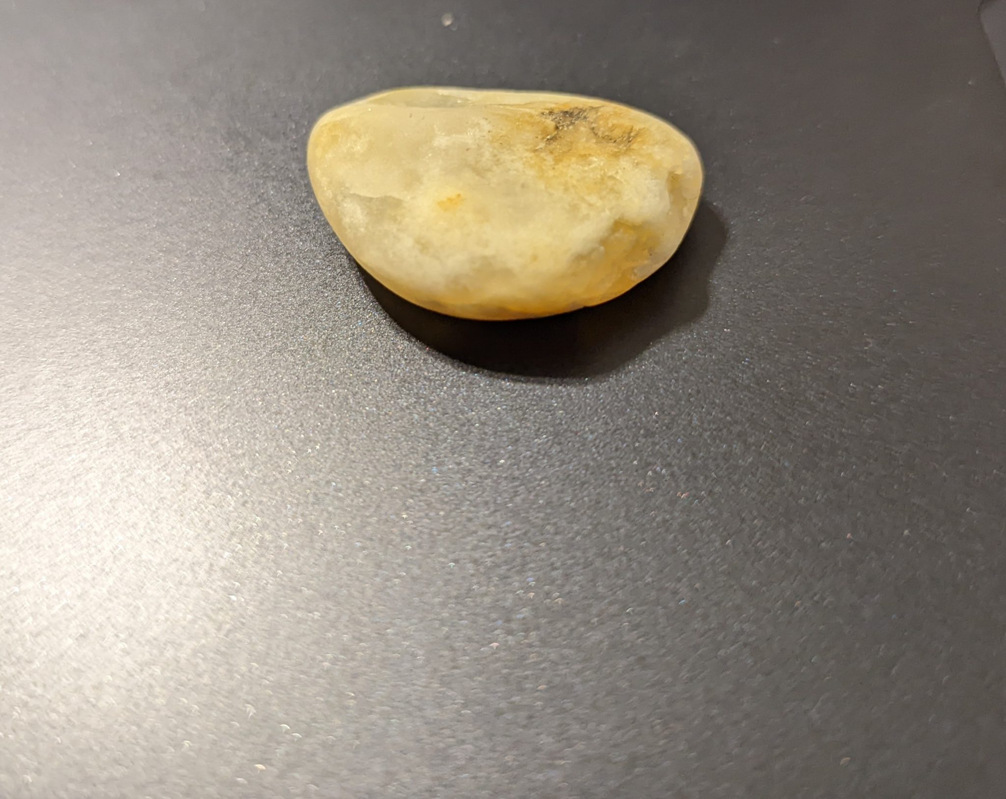 A small, beige rock.