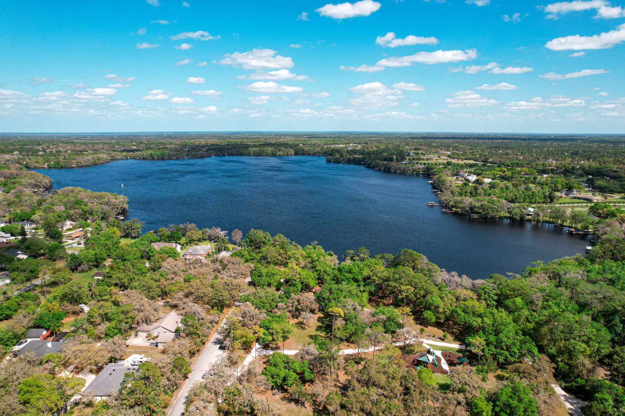 Aerial view of Lake Mills and the park in Chuluota, Florida