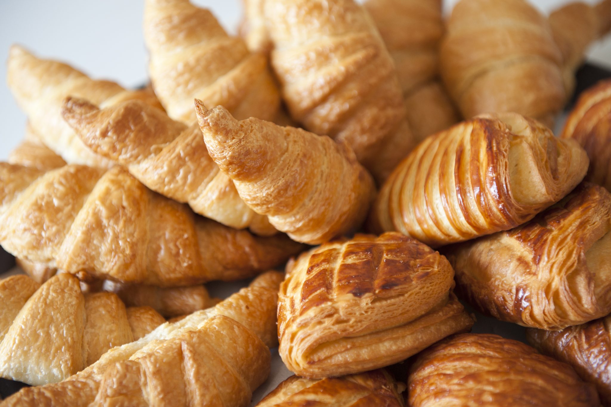 Close-up of croissants and other French pastries