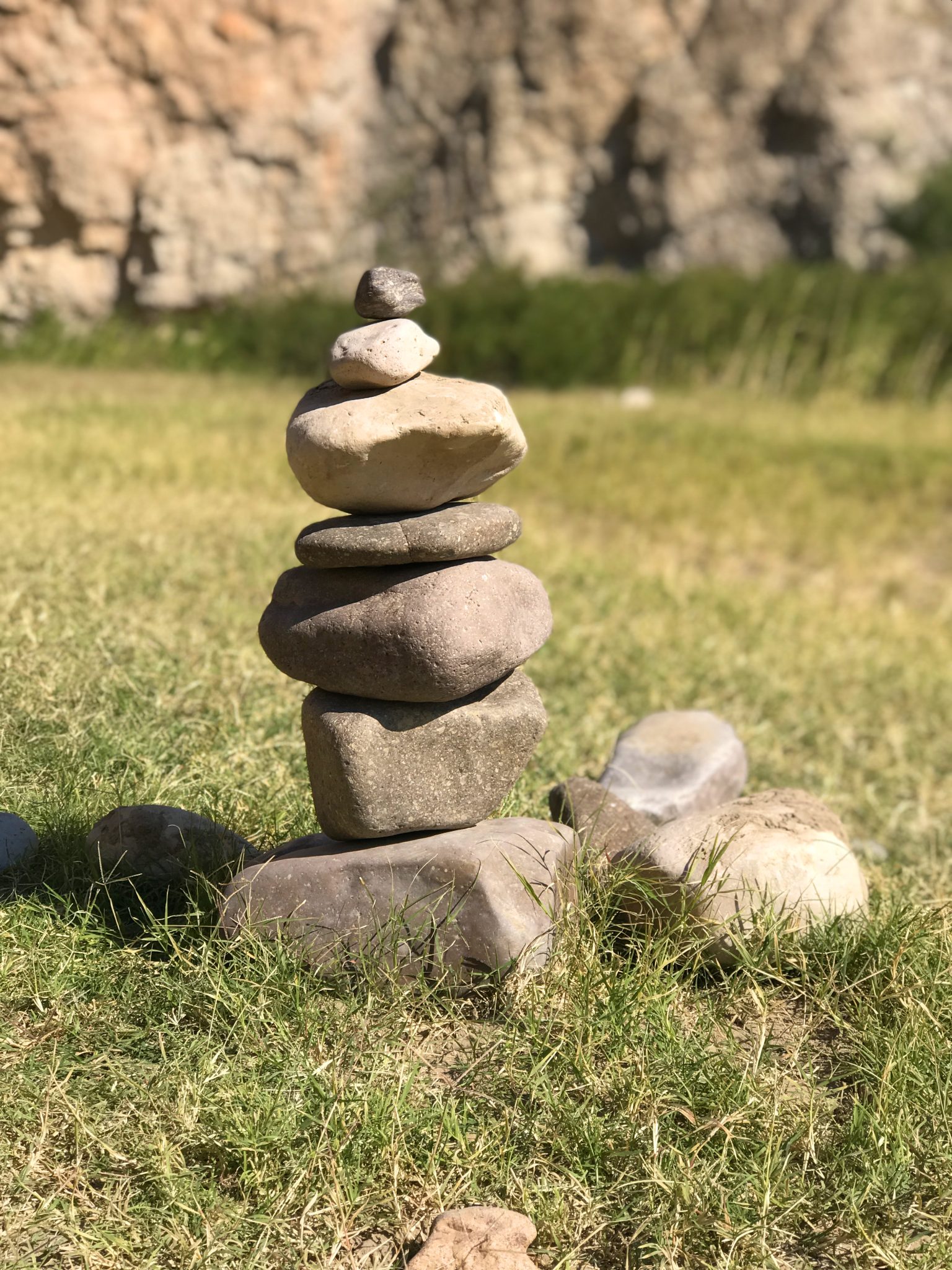 Balanced stacked rocks or hiking cairn