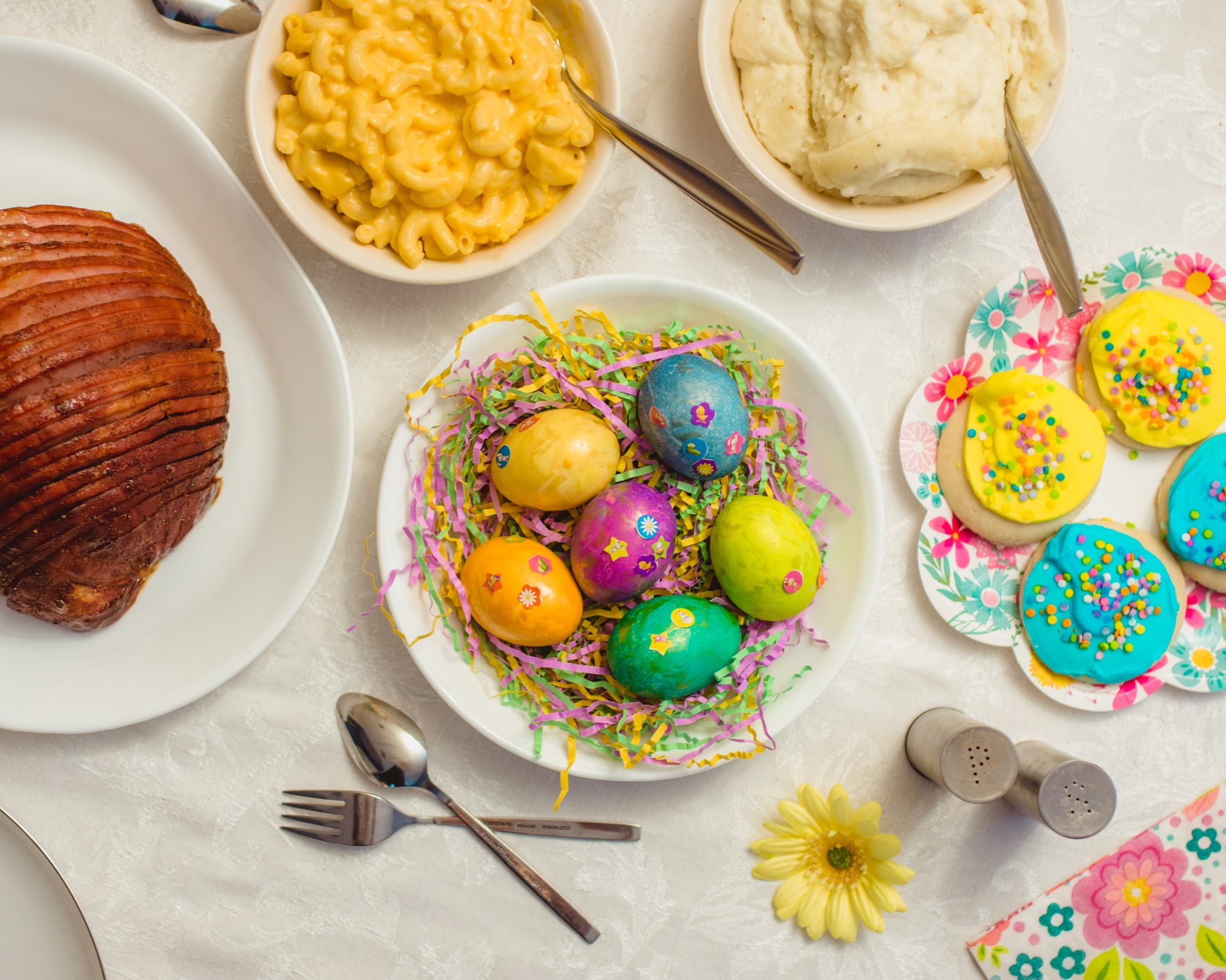 Flat lay of Easter eggs and brunch food