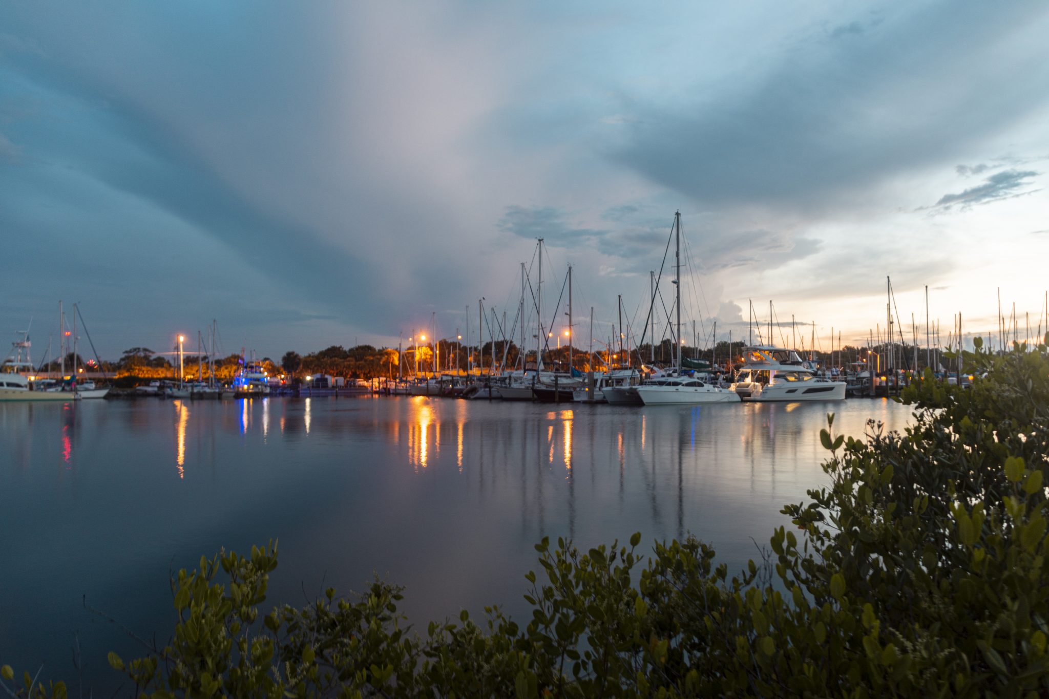 Marina with docked boats after sunset