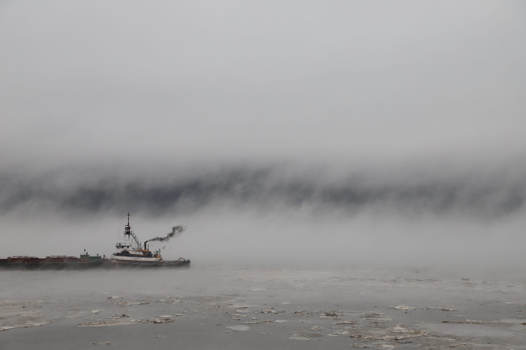 Tugboat on the icy Hudson River