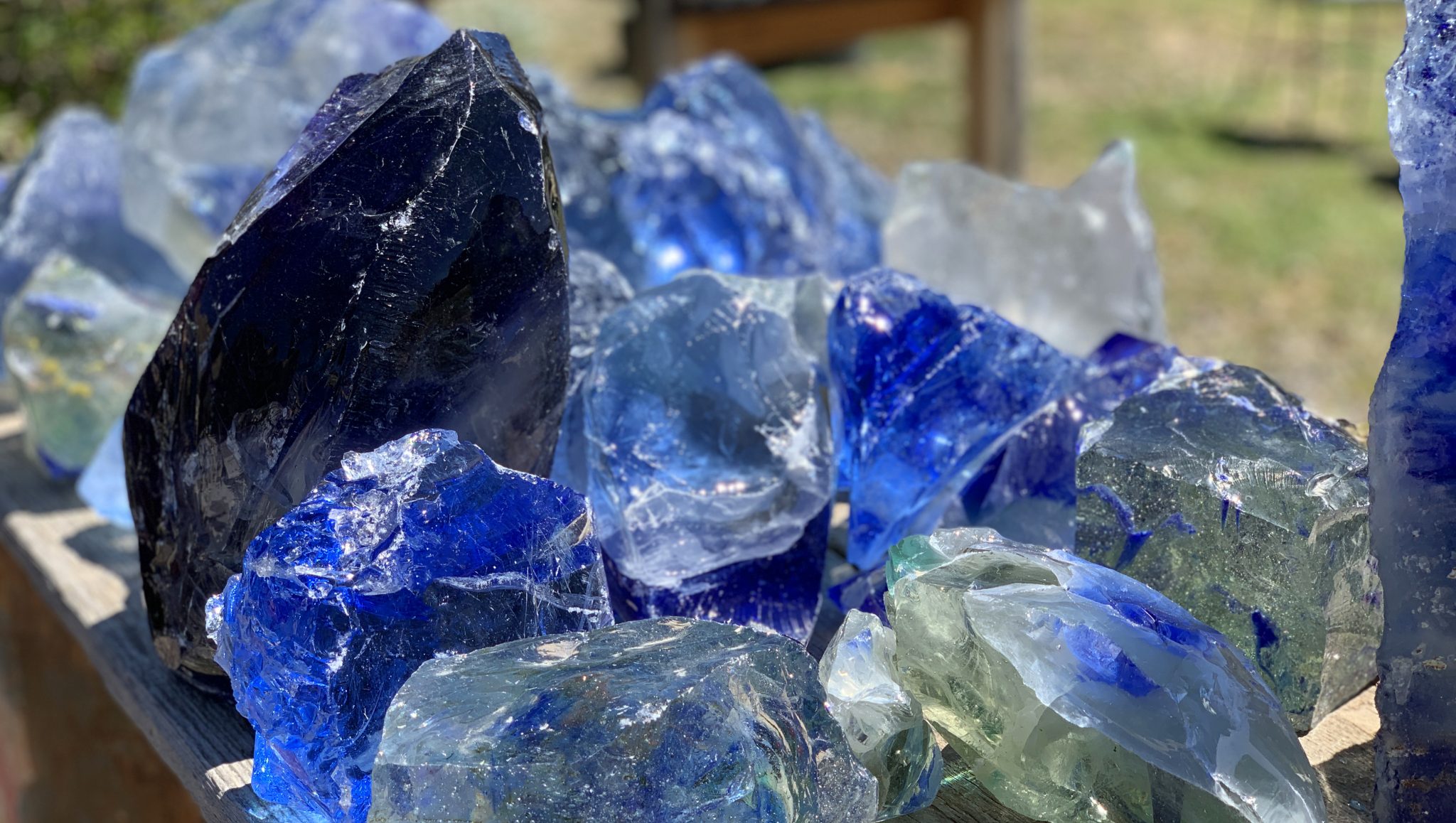 Pile of blue glass chunks in the sun