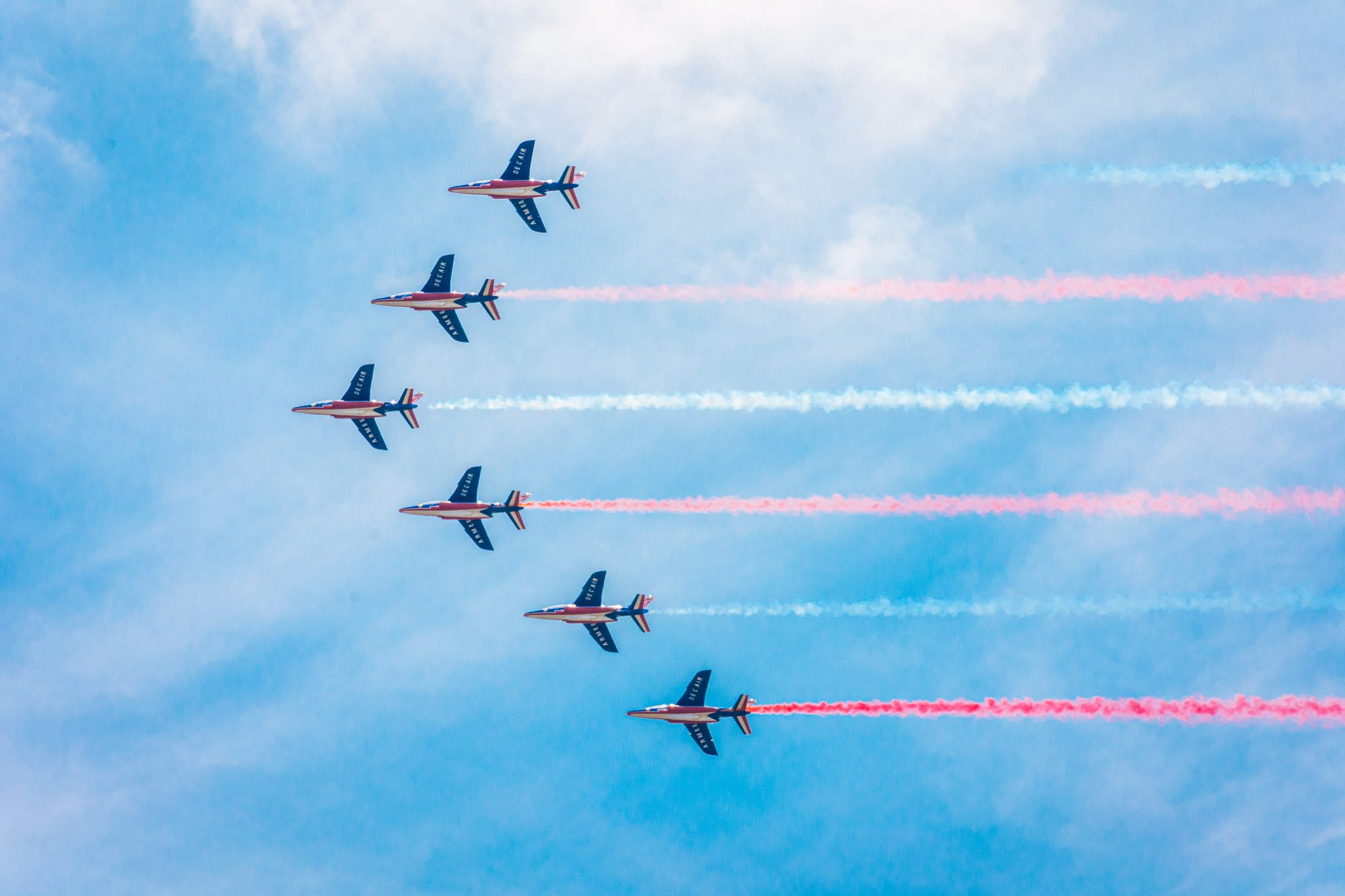French Armee Del'air planes in formation at an air show