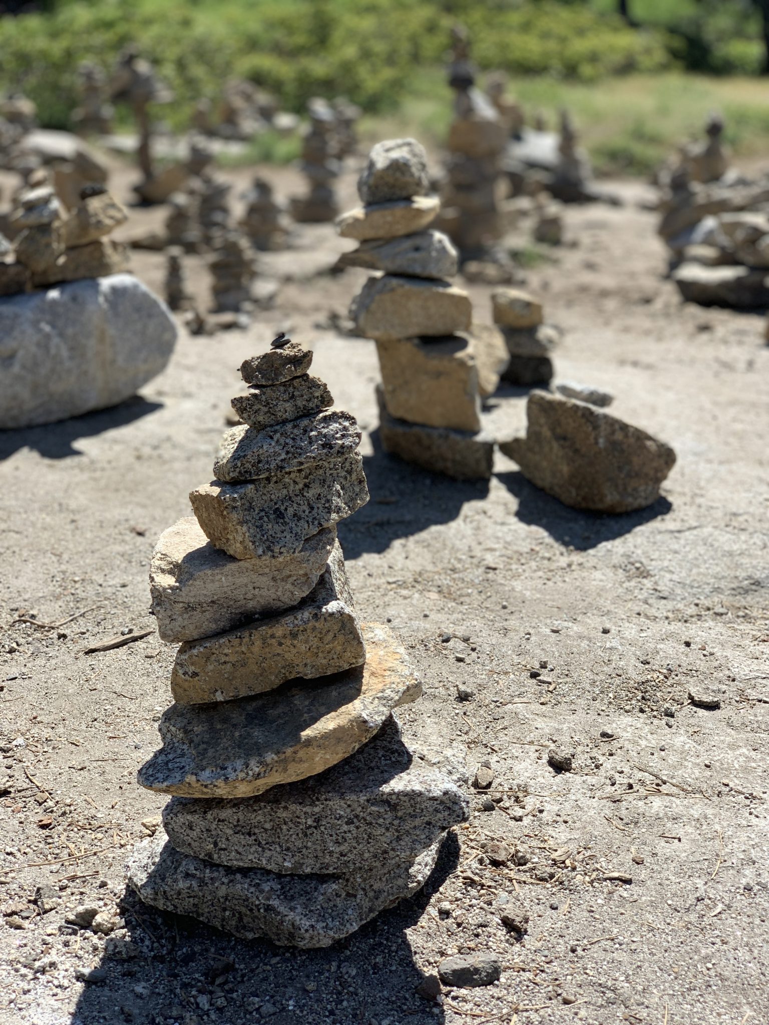 Group Of Stacked Rock Cairns For Trail Direction