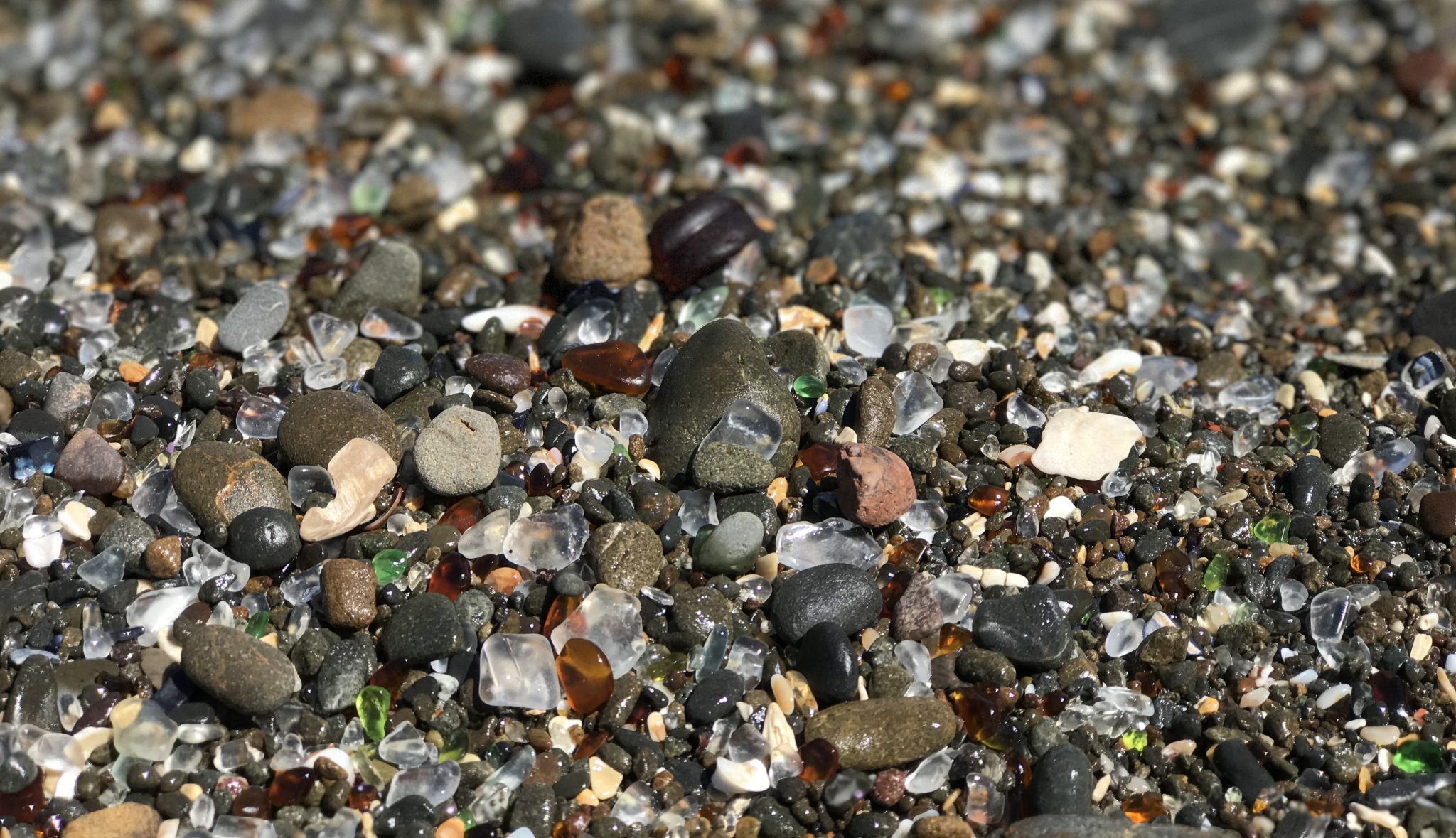 Polished glass and pebbles at Glass Beach in Fort Bragg