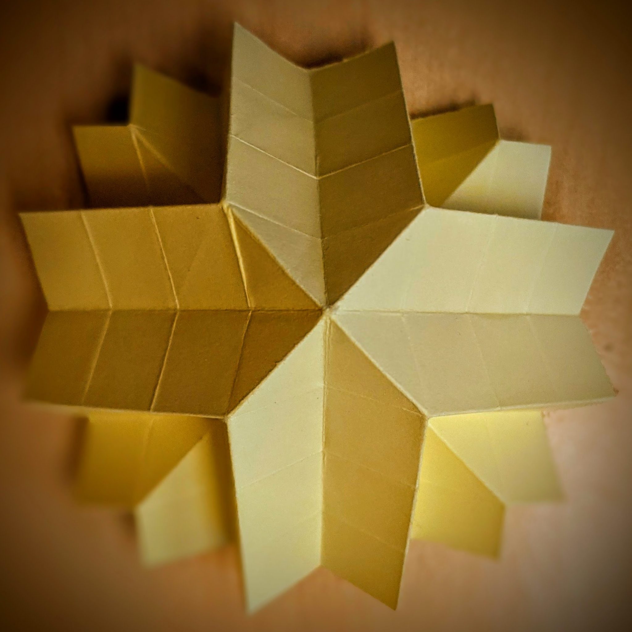 folded up sticky note in the shape of a star