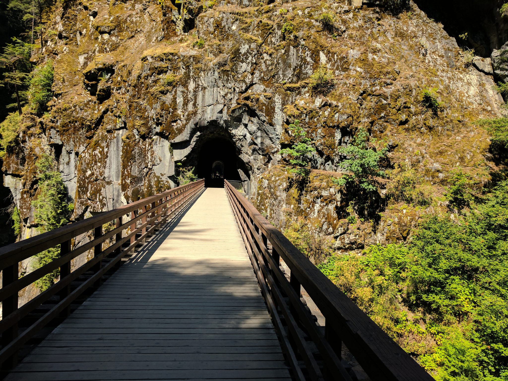 Footbridge going into a tunnel at Othello Tunnels near Hope British Columbia Canada