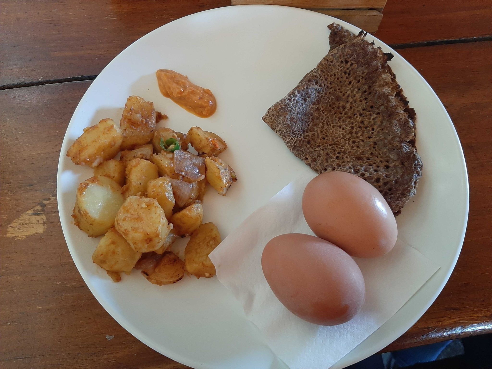 Breakfast from Himalayas - Millet Bread, Spicy Potato, Pickle, and Eggs