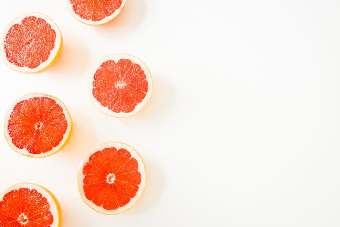 Sliced Tangerine on White Background