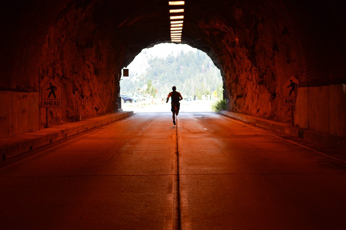 Man Running in Tunnel