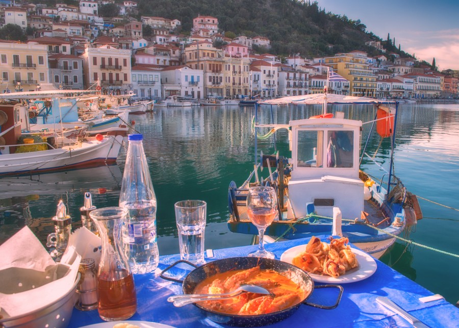 Sea Food By the sea with Gytheio Greek Location in the Backgound