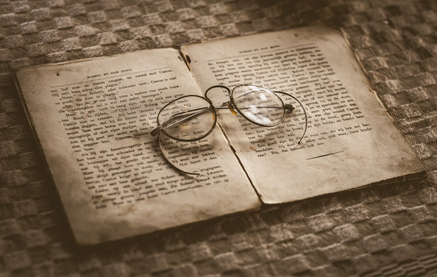 Antique glasses and book