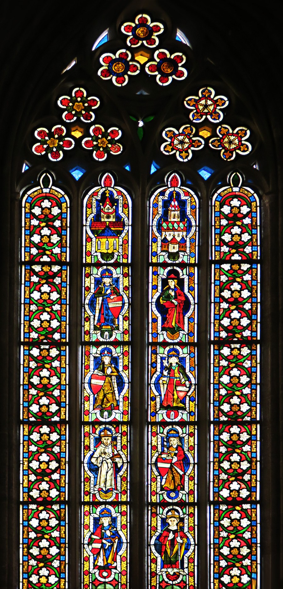 stained glass window with saints