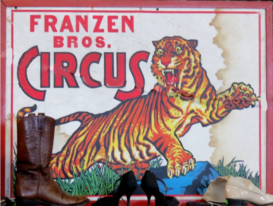 old circus poster with shoes