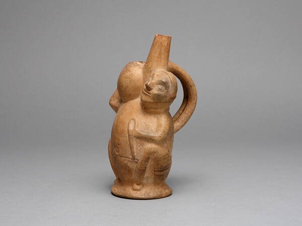 Handle Spout Vessel in the Form of a Seated Man Carrying a Jar