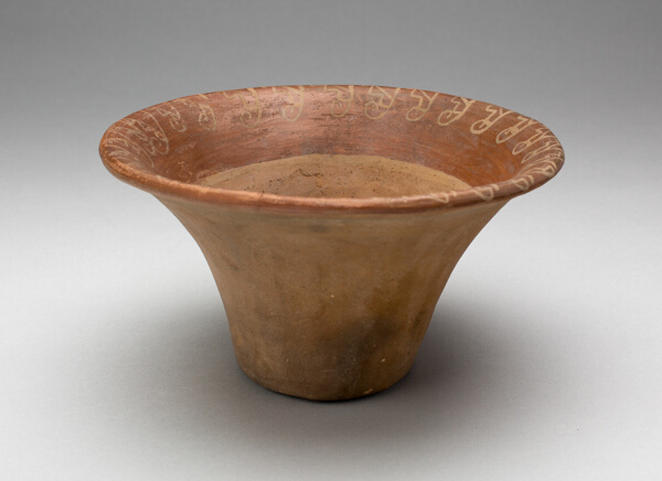 Flaring Bowl with Curving Step Design on Interior Rim