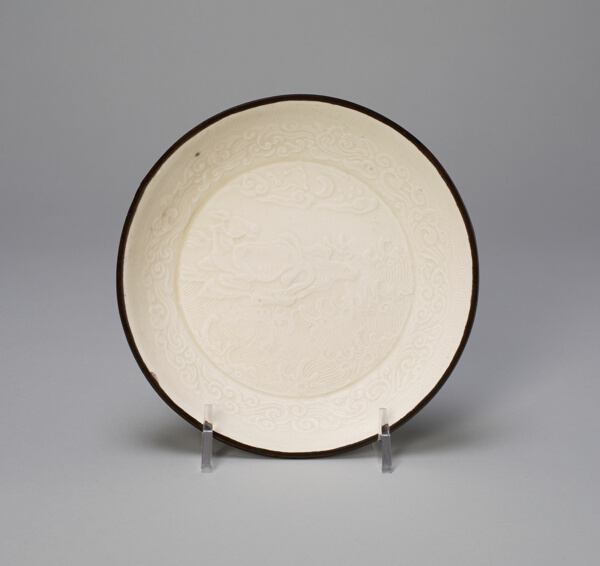 Dish with Mythical Bovine (Xiniu) amid Waves Viewing the Moon and Constellations