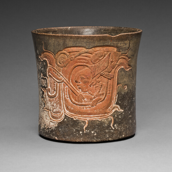 Carved Vessel Depicting a Lord Wearing a Water-Lily Headdress