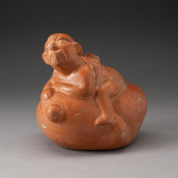 Stirrup Spout Vessel in Form of a Man Sitting atop a Vegetable