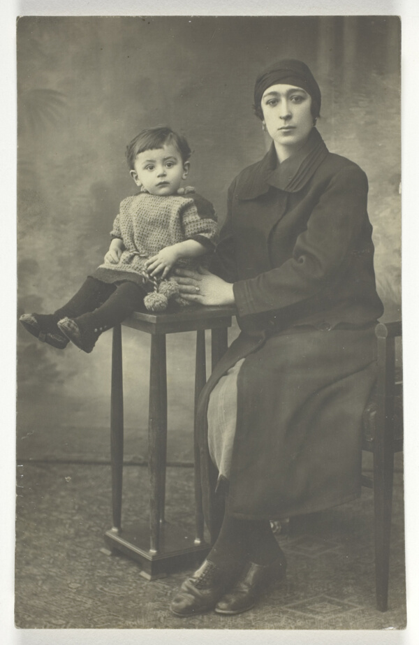 Untitled Postcard (Woman with Boy on Stand)