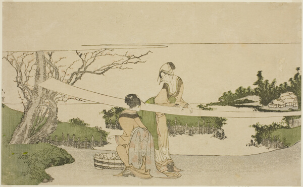 Two women stretching cloth