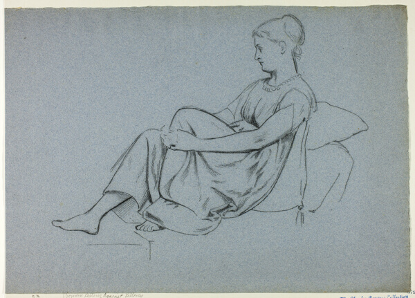 Woman Resting Against Pillows Clasping Her Knee