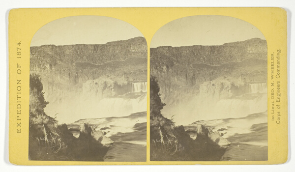 Shoshone Falls, Snake River, Idaho, Main Fall, 210 feet from upper to lower level, width of fall, 800 feet from upper to lower level; Height of Cañon wall at the falls, 1.000 feet. A number of minor falls, Islands, and boulder rocks above the main fall add beauty to the lonely majesty of this scene, No. 48 from the series 