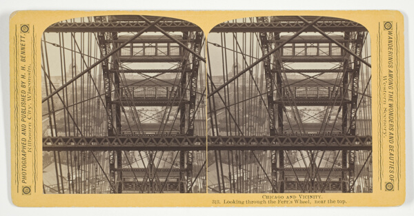 Looking through the Ferris Wheel, near the top, from the series 